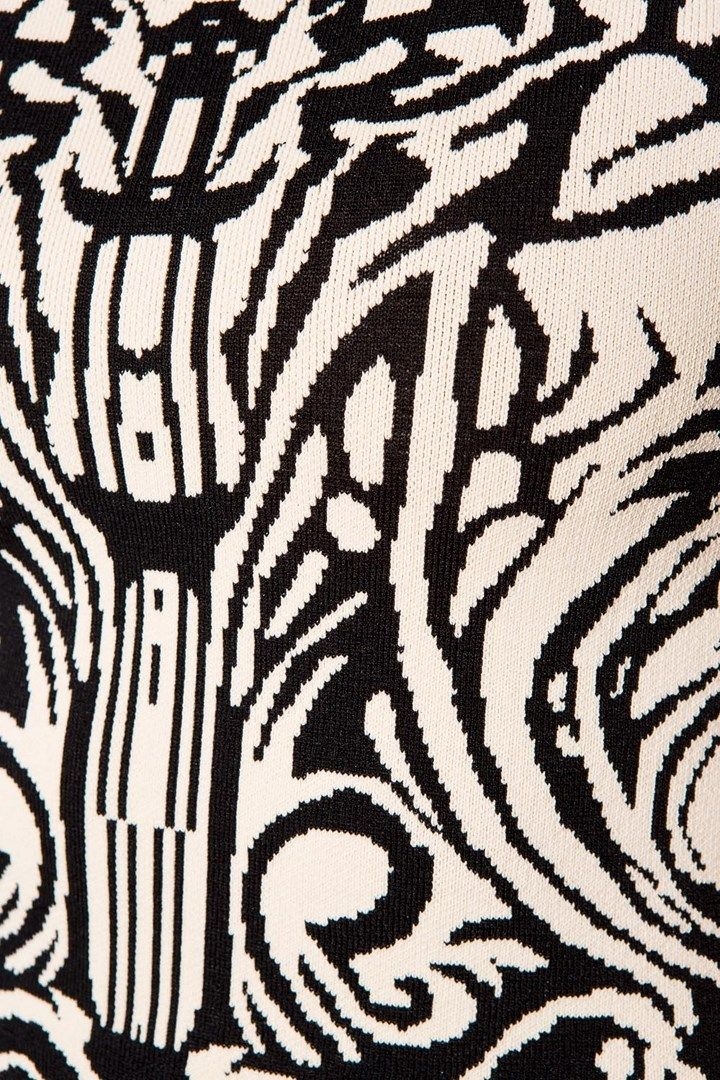 Vestido de punto ajustado beige con estampado